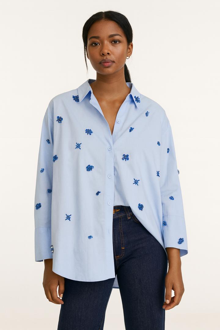 WhatsApp Image 2025-12-05 at 5.54.28 PM ZARA Light Blue Shirt with Beaded Details – Size M - Image 1